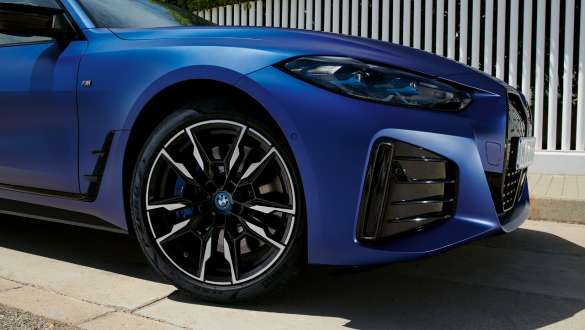 BMW i4 M50 drivetrain BMW i4 M50 G26 2021 BMW Individual Frozen Portimao Blue metallic rear view driving