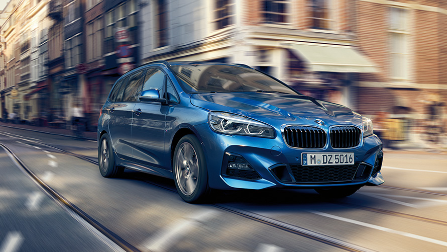 BMW 2 Series Gran Tourer F46 three-quarter front view driving on the street BMW 2 Series BMW 2 Series Gran Tourer F46 three-quarter front view driving on the street