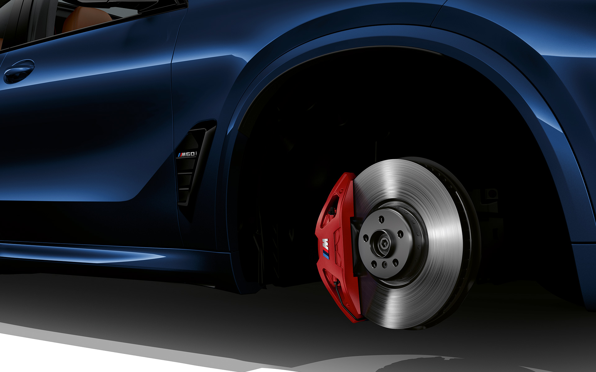 BMW X5 M60i xDrive G05 MP M Sport brake close-up