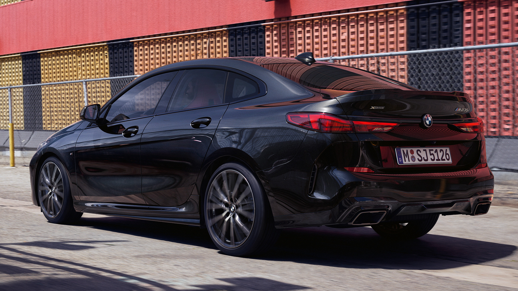 BMW M235i xDrive Gran Coupé three-quarter rear view BMW M235i xDrive Gran Coupé 2020 Black Sapphire metallic F44 three-quarter rear view exterior