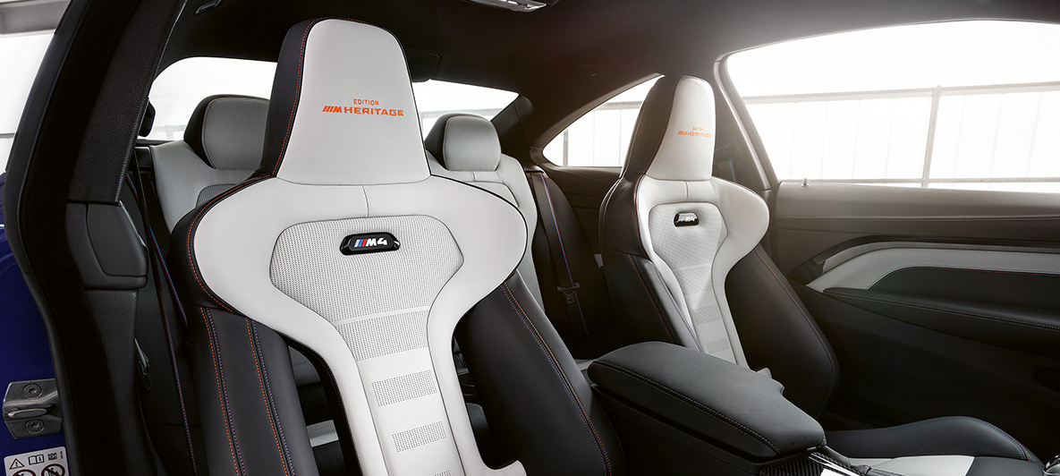 BMW M4 Coupé, M Heritage Edition M Sport seats in Bicolour Silverstone / Black with contrast seams in Violet and Orange BMW M4 Coupé, M Heritage Edition, special edition, M Sport seats in Bicolour Silverstone / Black with contrast seams in Violet and Orange