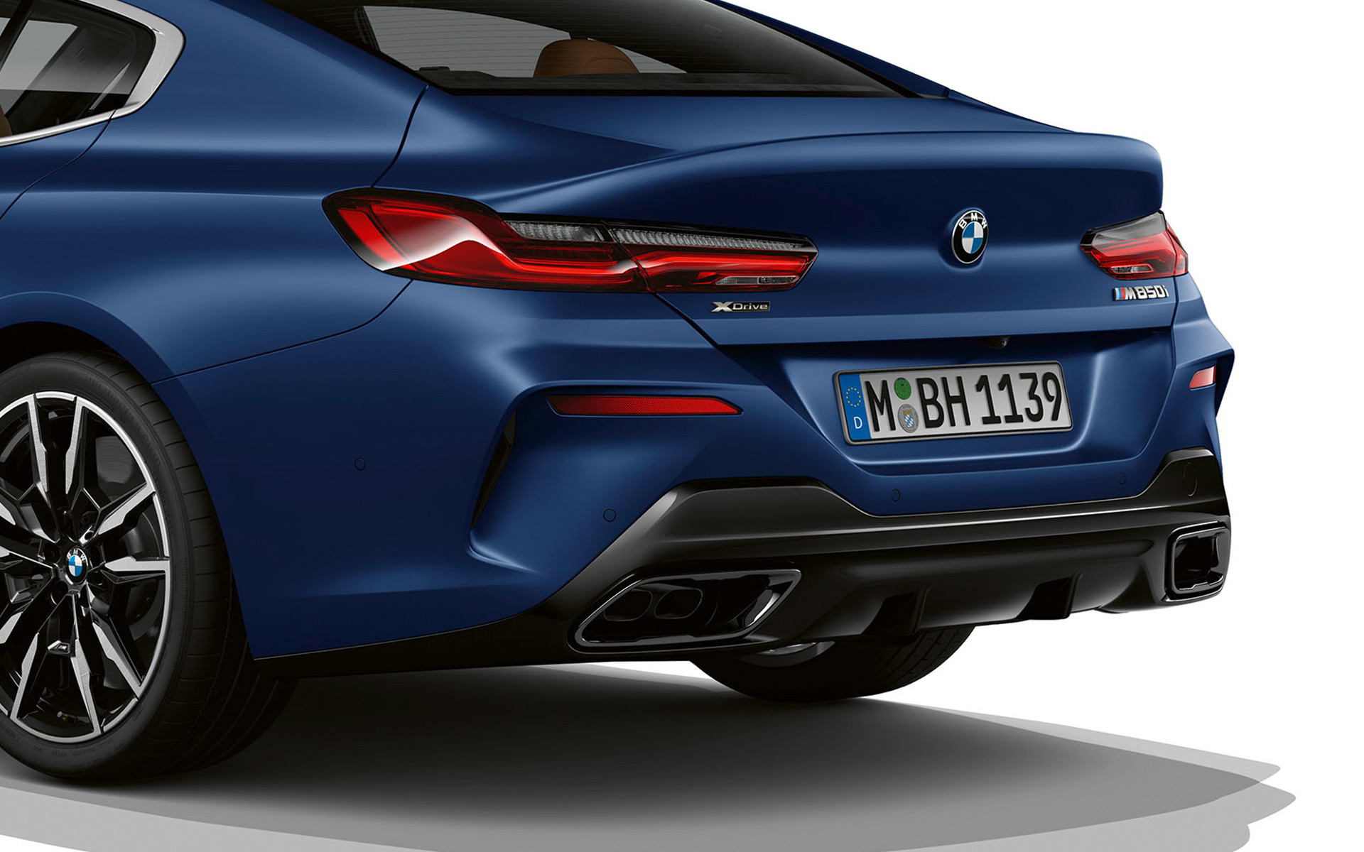 three-quarter rear view BMW M850i xDrive Gran Coupé G16 LCI Facelift 2022 BMW M850i xDrive Gran Coupé G16 LCI Facelift 2022 three-quarter rear view rear section in detail