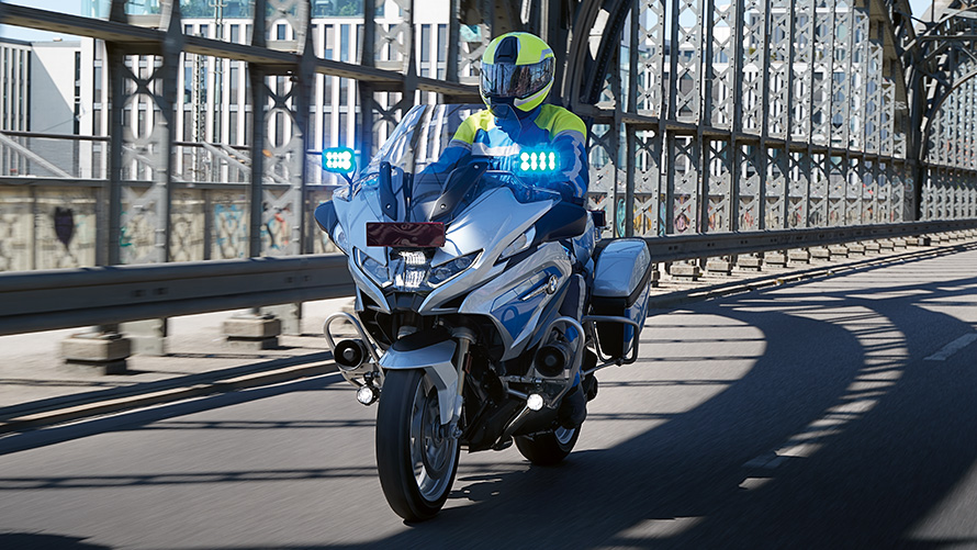BMW R1250RT police motorcycle BMW R1250RT police motorcycle front view bridge driving
