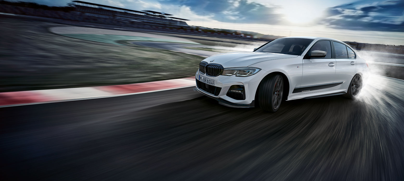 M Performance Parts M Performance Parts: white BMW drives on race track